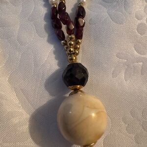 Elegant Beaded Necklace with Gold beads and Garnet Stones